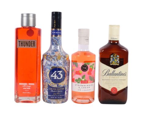 A bottle of Ballantines Finest Blended Scotch Whisky, a Spanish liqueur, and 2 others