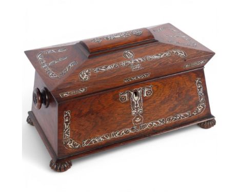 A large William IV Regency mother-of-pearl inlaid rosewood sarcophagus tea caddy, with fitted interior having removeable cadd
