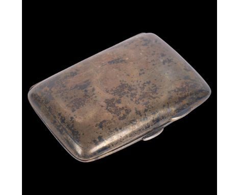 An Art Deco George V silver cigarette case, Morris & Baker, Birmingham 1920, curved rectangular form, with engine turned deco