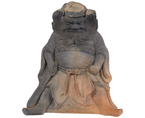 A large Japanese pottery 'Shoki' Onigawara roof tile, 39cm