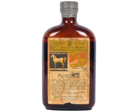 A bottle of The Old Blend Scotch Whisky Of The White Horse Cellar, from the original recipe, aged in wood, bottled 1948, no. 