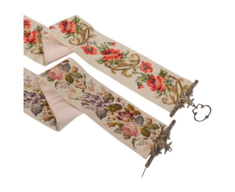 2 similar cross-stitch tapestry floral design curtain tiebacks with brass mounts, longest 124cm