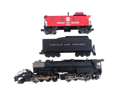 An MTH Rail King 2-8-8-2 O gauge locomotive, no. 2195, Norfolk &amp; Western, a Norfolk &amp; Western tender, and a Norfolk &