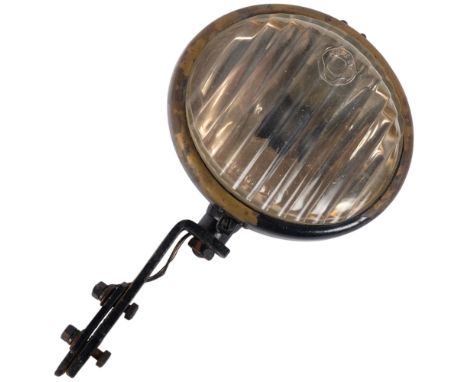 A Vintage Notek black Fog-Master Classic car headlight