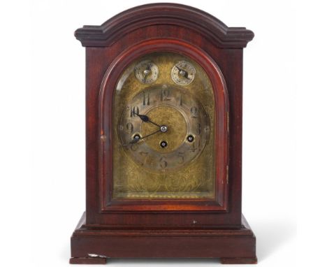 An early 20th century stained mahogany 8-day chiming mantel clock, floral engraved brass dial with silver chapter ring, Arabi