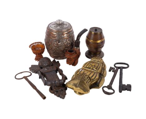 A Royal Doulton silvered jar and cover, a brass galleon design door knocker, 20.5cm, a cast-iron knocker, a pipe, a treen str