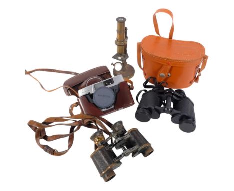 A Mamiya cased camera, Zenith 8x30 binoculars, cased, Antique brass microscope, H20cm, and a pair of Vintage binoculars