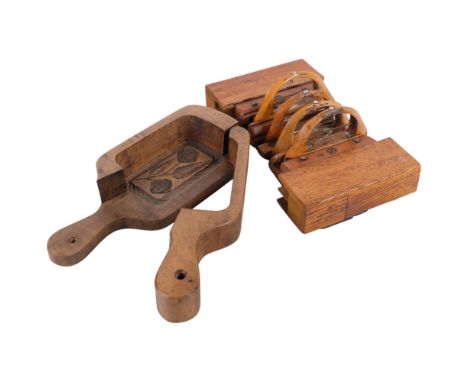An unusual Vintage oak loom shuttle, L26cm, and a carved wood butter mould with floral design