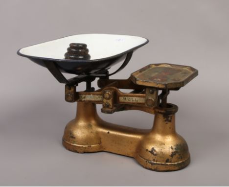 A set of Pearlman &amp; Co. scales with weights.