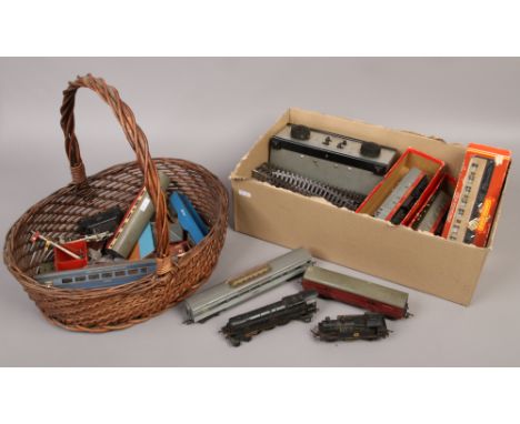 A collection of model railway to include Triang oo gauge track rolling stock Diesel T.C series loco and a Hammant &amp; Morga