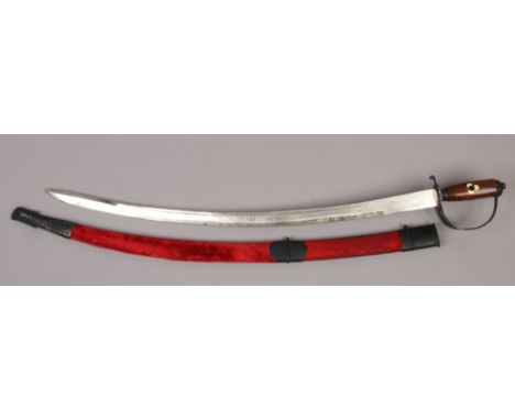 An Indian dress sword with inlaid hardwood grip, etched blade and velvet mounted scabbard.