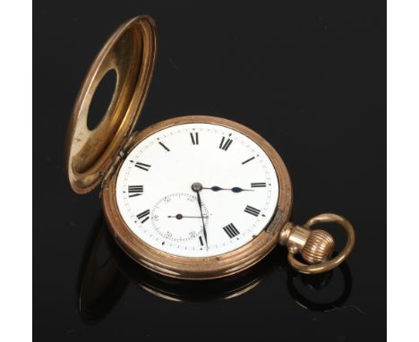 A gold plated half hunter pocket watch in Dennison case with white enamel dial and second subsidiary dial, in need of restora