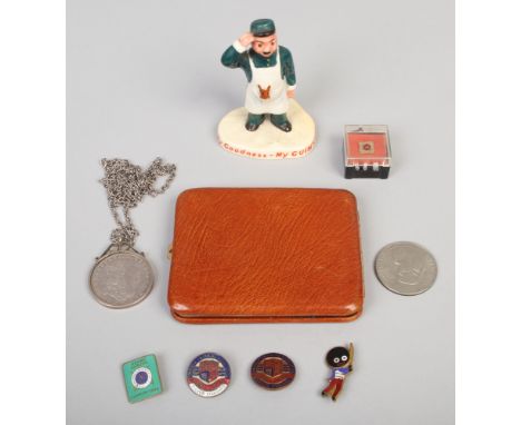 A small group of collectables to include Carltonware Guinness figure, dollar on silver chain, cigarette case, enamel badges e
