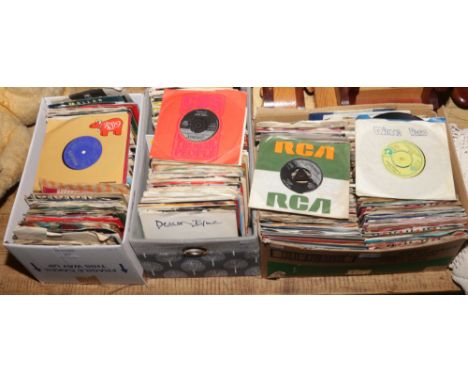 Three boxes of 45rpm single records including Fleetwood Mac, Duran Duran, Roger Daltrey, Bob Dylan, Van Halen etc.