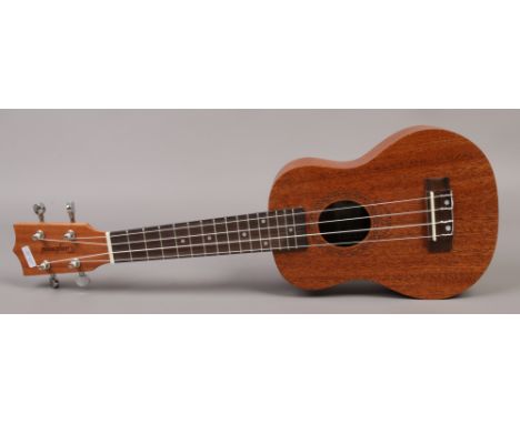 A cased tanglewood ukulele manufactured in China.