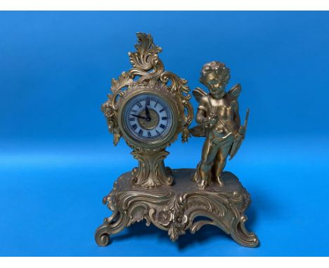 A small gilt metal clock by the Ansonia clock company, 21cm height