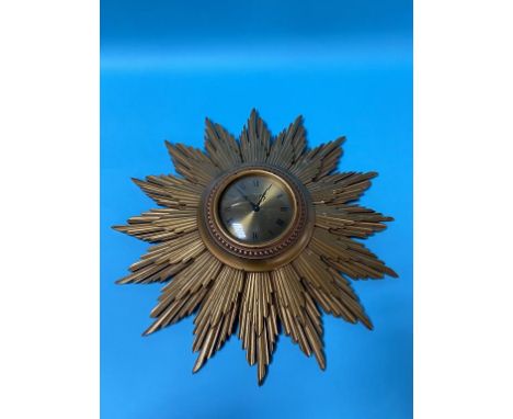 A Metamec Sunburst wall clock, 42cm diameter