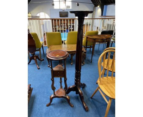 A reproduction wig stand and reproduction mahogany plant stand