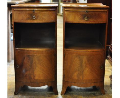 A pair of walnut bow front bedside cupboards, 38 cm wide, and a 19th century mahogany pembroke table (3) Condition report Rep