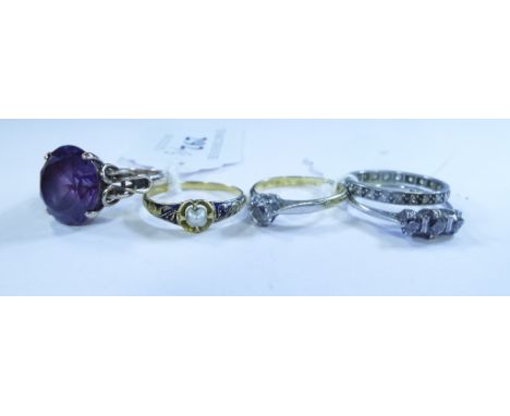 A yellow coloured metal, pearl and enamel memoriam ring, and four other rings (5)