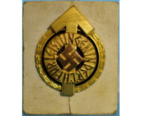 A Hitler Youth Leader Sports Badge, the reverse marked RZM M 1/101 and numbered 11712, with a vertical pin, possibly mounted 