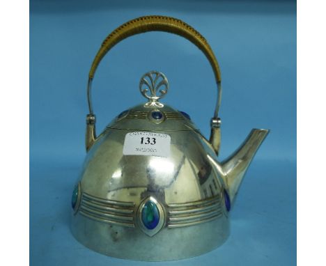 A WMF silver plated teapot, with stylised embossed decoration and blue enamel lozenges, 20.5 cm high