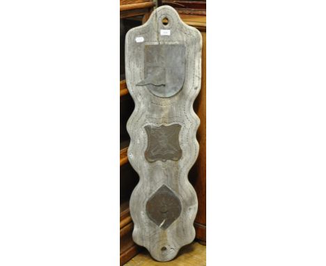 A sundial, mounted on a wooden plaque, 112 cm high