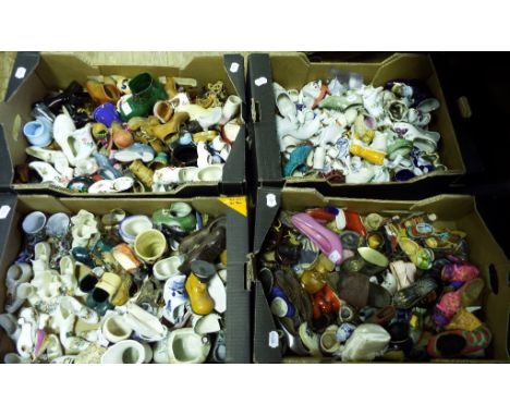 Assorted crested ware shoes, other ceramic and glass shoes (4 boxes)