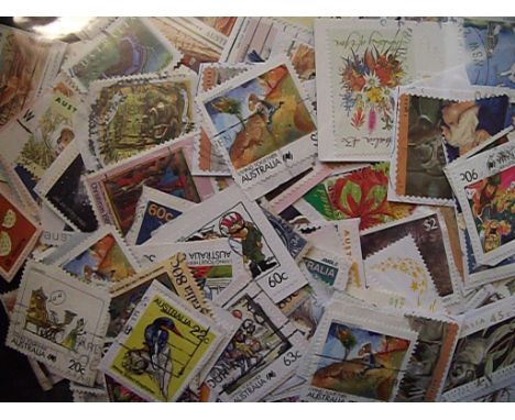 A group of assorted stamps and first day covers, in albums and loose (box)
