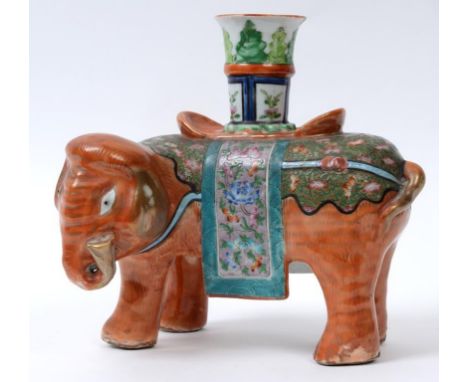 A Chinese porcelain famille rose incense holder, in the form of an elephant (chips), 22 cm high  See illustration Condition r