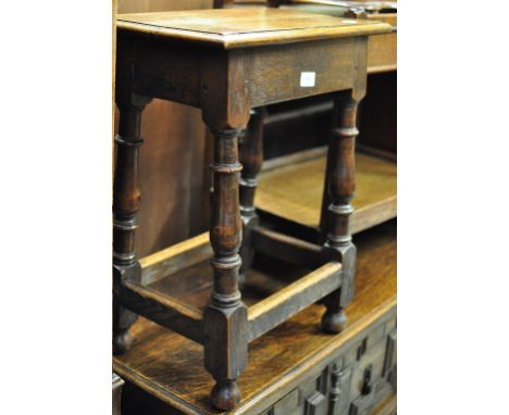An oak joint stool, another stool, a walnut bedside cupboard, and a folding card table (4)