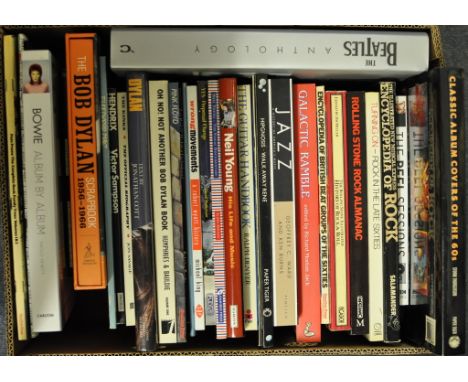 Assorted music related volumes, including The Beatles Anthology, The Bob Dylan Scrapbook 1956-1966, Bowie Album By Album (6 b