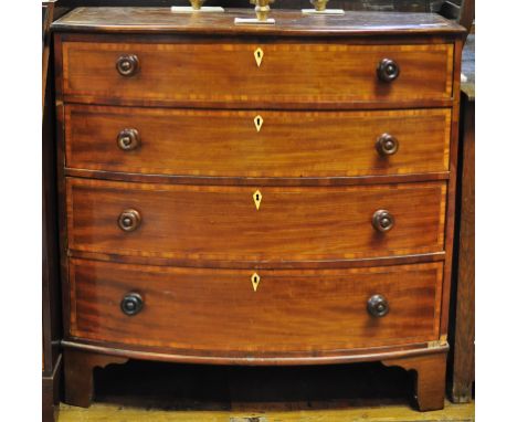 A 19th century inlaid mahogany bow front chest, of four graduated long drawers, 102 cm wide