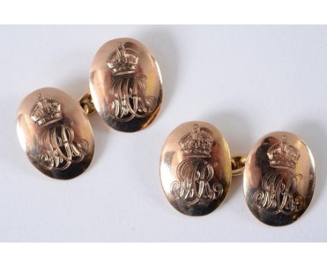 Royalty interest: A pair of 9ct yellow gold oval cufflinks, with King George and Queen Mary initials beneath their crown  See