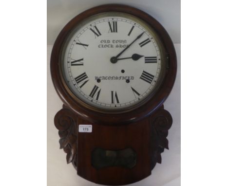 A late 19thC and later mahogany cased drop-dial wall clock with a turned surround and pendulum window; the bell strike moveme