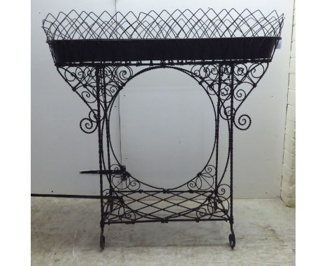 A mid 20thC Victorian style wire bound planter&nbsp; 33"h&nbsp; 32"w 