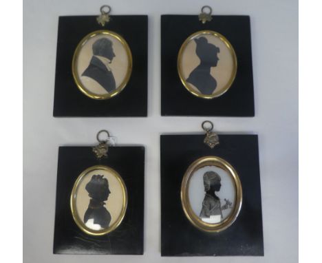 Four similar 19thC oval profile head and shoulders portrait miniature silhouettes, each in a convex glazed, gilt metal frame 