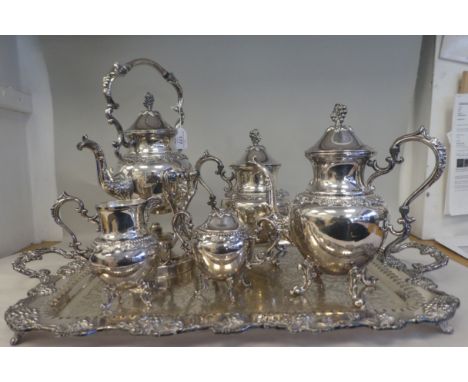 A vintage 19thC style B &amp; Co silver plate on copper five piece tea/coffee set of bulbous form with decoratively cast frui