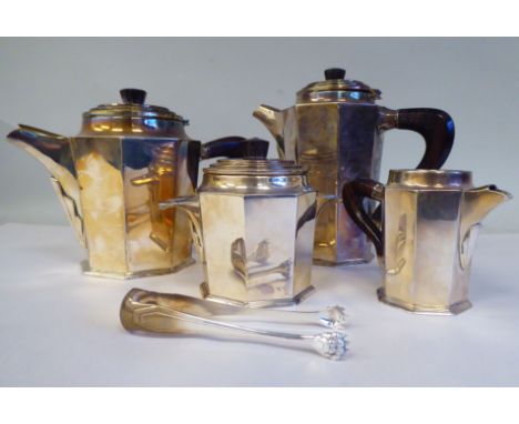 An Art Deco period Continental (possibly French) four piece silver coloured metal coffee set of octagonal form with carved ha