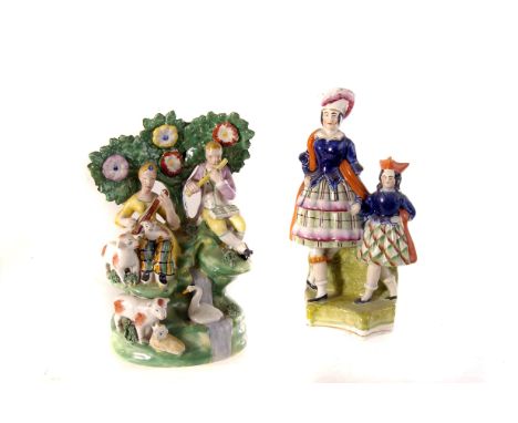 A selection of Staffordshire ceramic figures, including cricketers, one with two figures playing musical instruments, one wit
