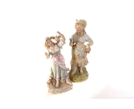 A collection of ten Gebruder Heuback bisque figures, all of different designs, with male and female figures wearing period dr