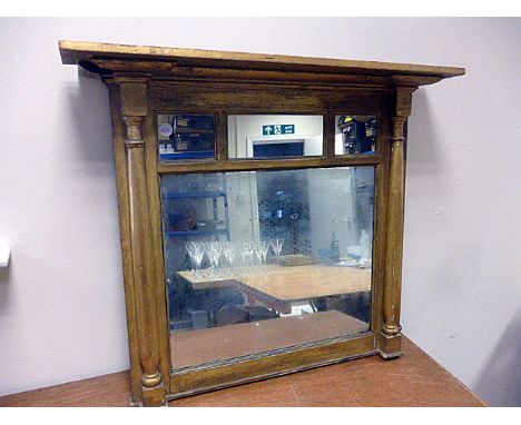 A gilt paint overmantle mirror, having small central rectangular mirror, flanked by two smaller square mirrors, above the lar
