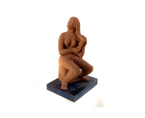 A Helen Stirling Meyer terracotta maquette, the seated female figure playing with her hair, signed to bottom of wooden base