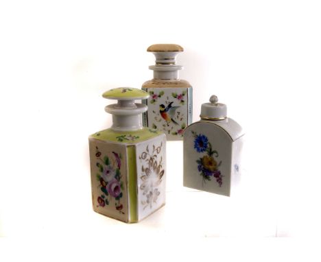 Three continental ceramic caddy bottle, one with hand painted floral decoration, another with bird amongst foliate design and