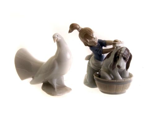 A Lladro figure entitled 'Bashful Bather', 5455, together with a Nao figure of a white bird (2)