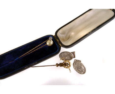 A Gentleman's lot: A pair of silver cufflinks with engraved swag design, marked Birmingham, together with two stick pins and 