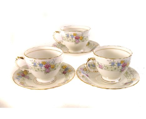 A Sutherland china part tea set, decorated with wall flowers, comprising sandwich plates, cups and saucers, sugar bowl and mi