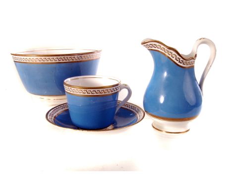 A pale blue and gilt decorated part tea set, comprising cups, saucers, side plates, sandwich plates, milk jug and bowl (parce