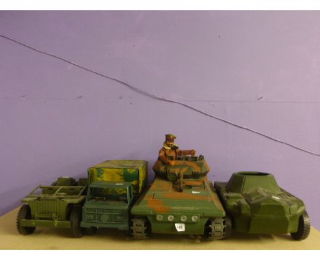 Three original Action Man vehicles plus another military vehicle