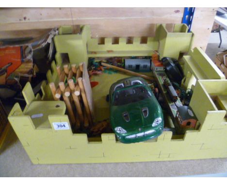 Wooden Fort with numerous toys including vintage Dinky Massey Ferguson, tin plate train toy, plastic figures etc
